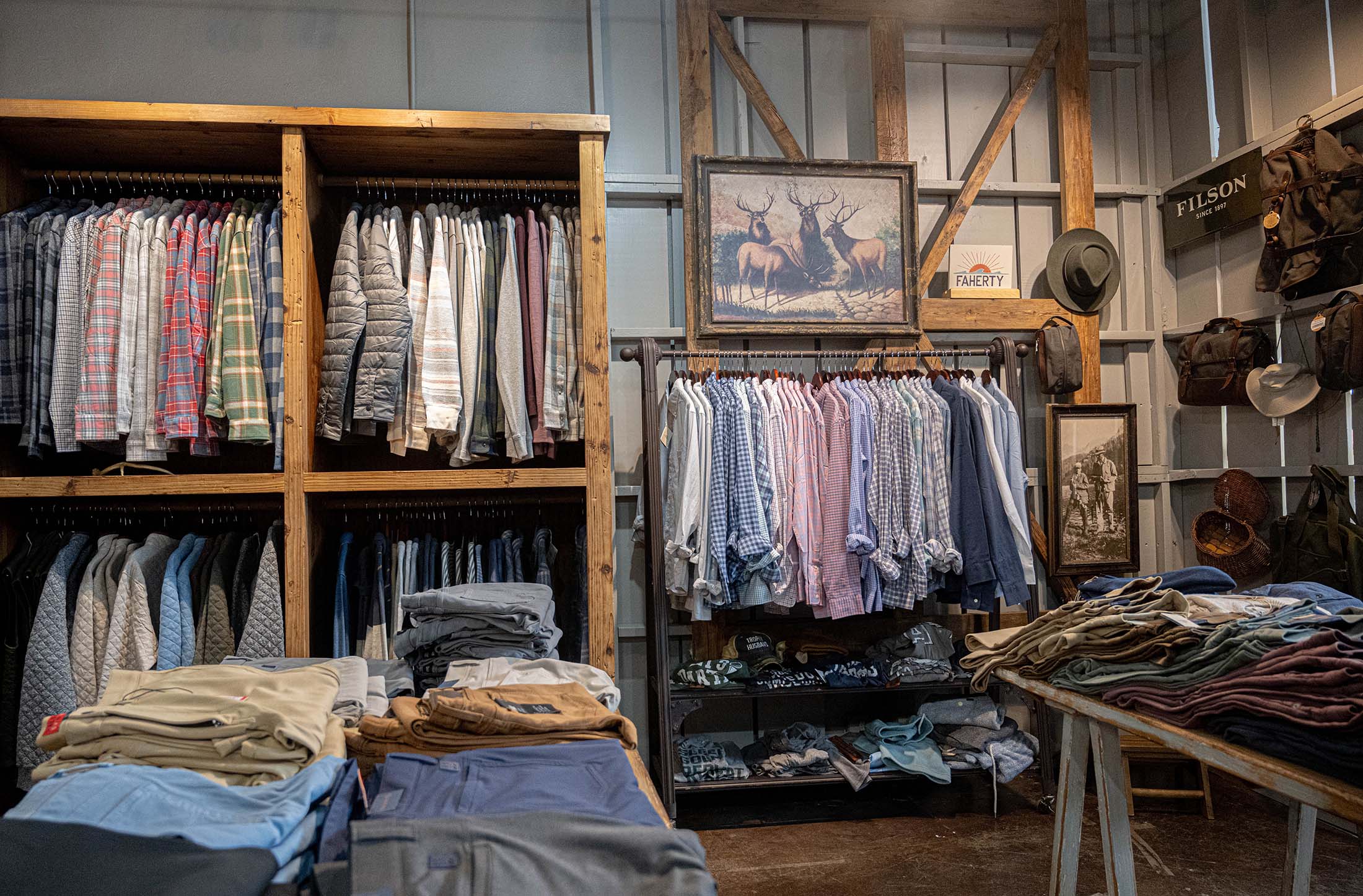 Bell & Sward store interior showing high quality shirts hanging in wood racks